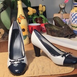 Elegant Black and Cream Pumps